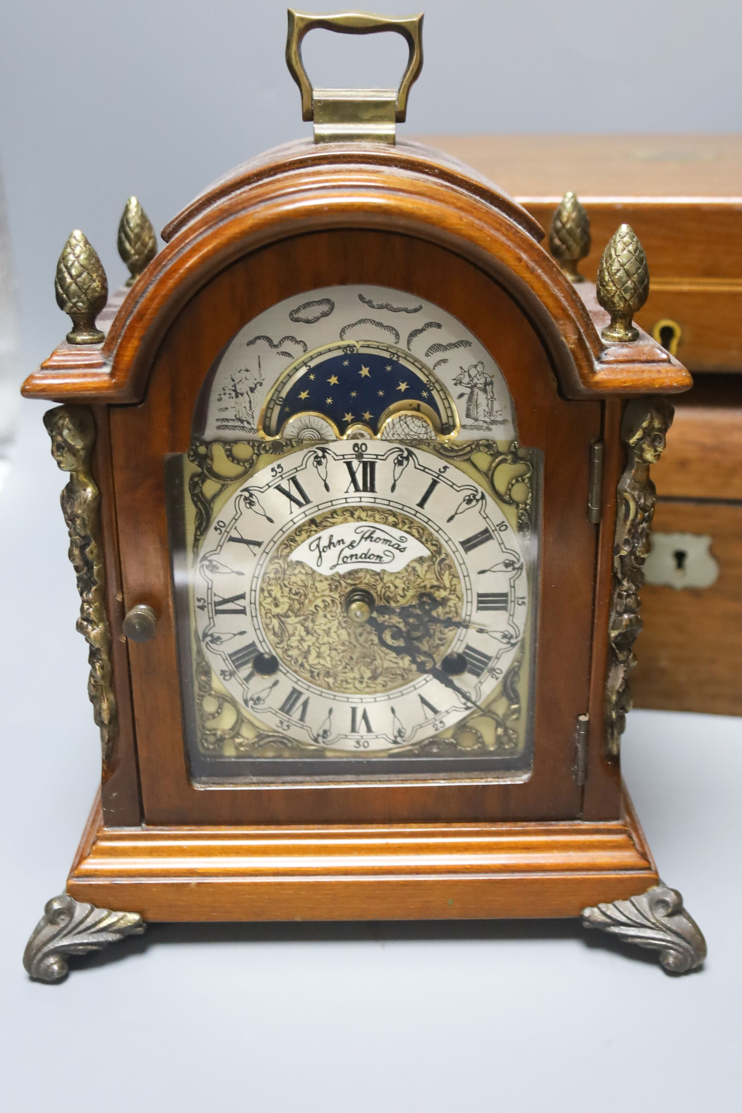 A Victorian rosewood writing box, a Georgian style mantel clock by John Thomas, London and sundry boxes